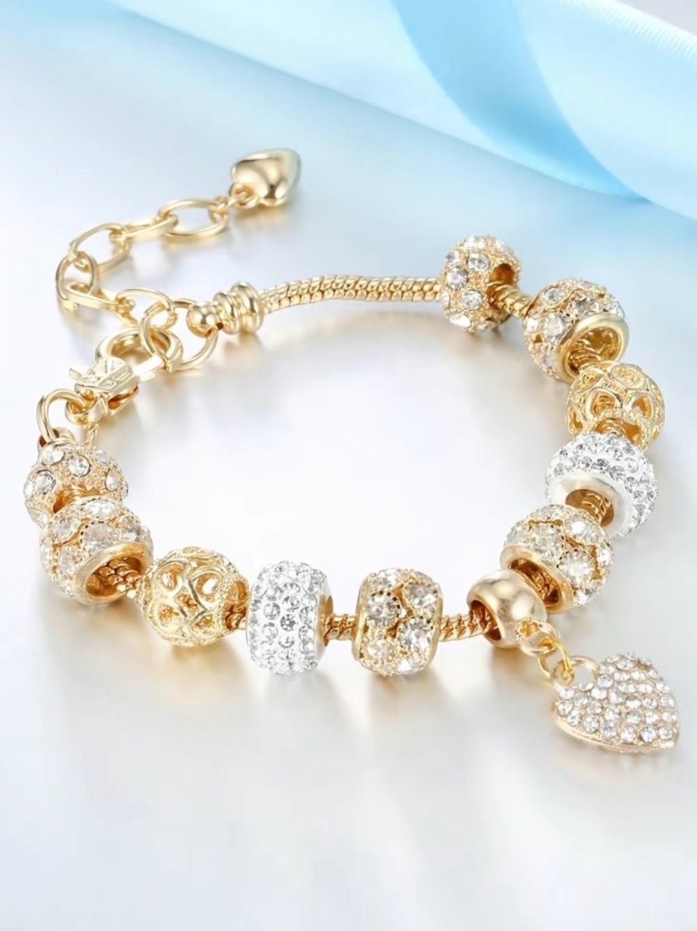 Gold Tone Crystal Heart Charm Bracelet